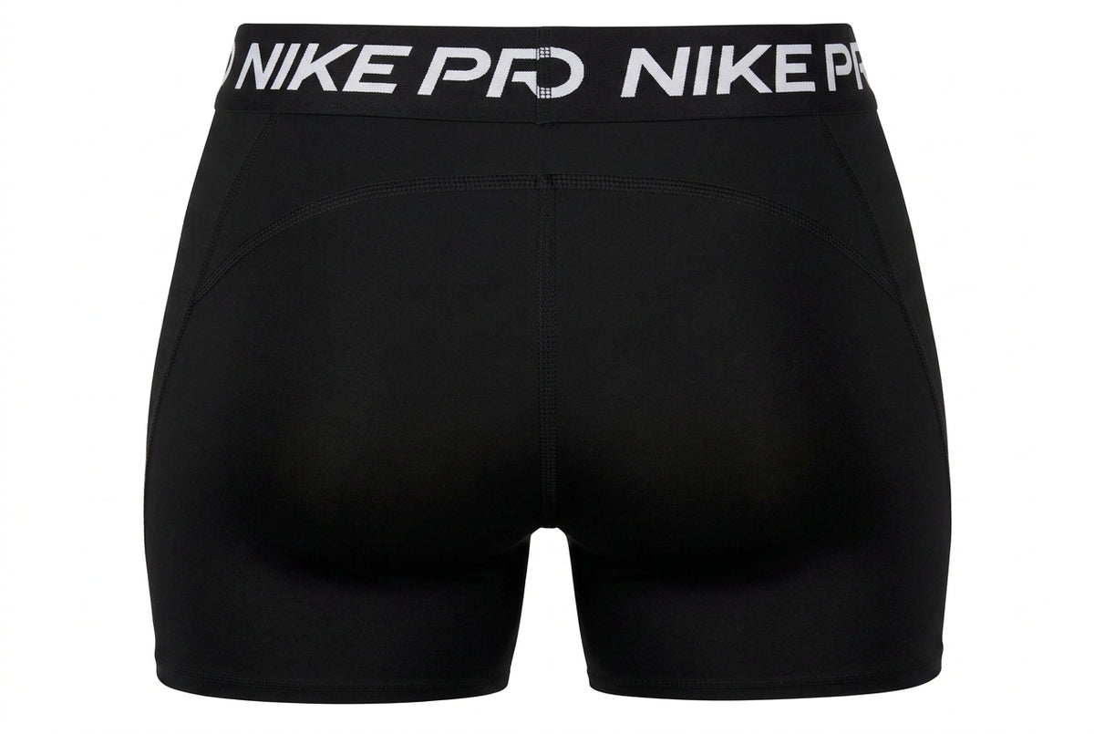 Black Nike Pro athletic compression shorts shown from the back, featuring a wide black waistband with 'NIKE PRO' printed in white.