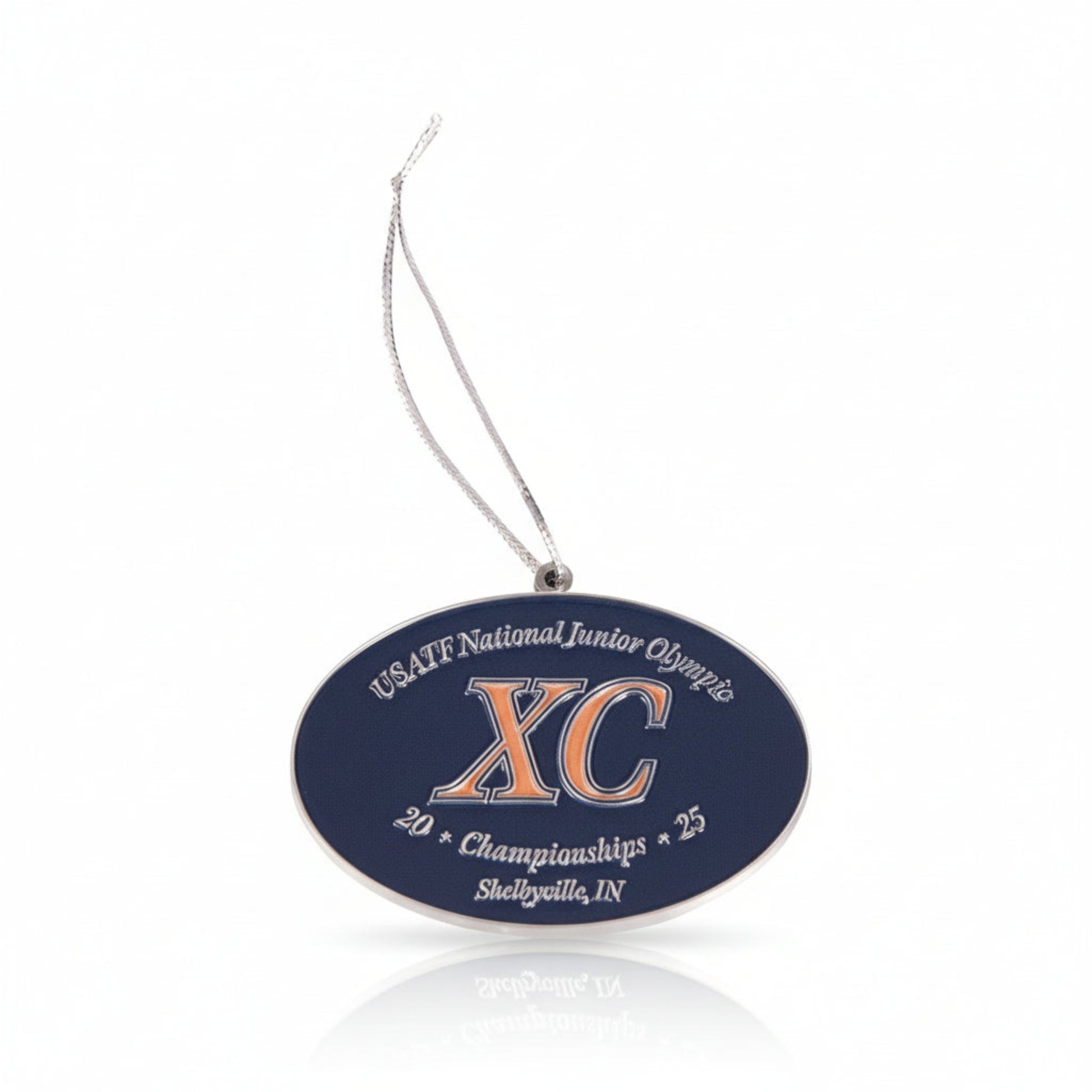 Decorative ornament with 'USATF National Junior Olympics XC Championships' text on a white background