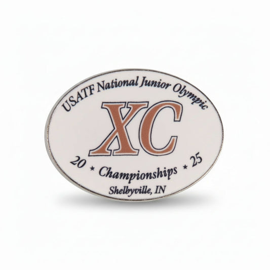 Oval-shaped badge with USATF National Junior Olympic XC Championships text on a white background