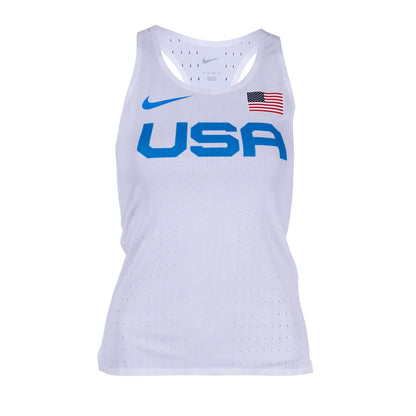 A white Nike singlet with the USA flag and Nike logo, designed for running with a relaxed fit.