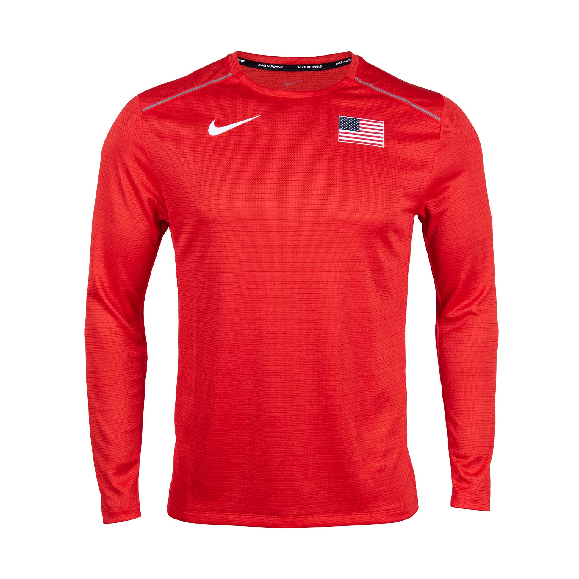 A long-sleeved red Nike Miler top with a V-neck, featuring a reflective Swoosh logo on the chest and a Nike logo on the upper left. The shirt is made of polyester and is machine washable.