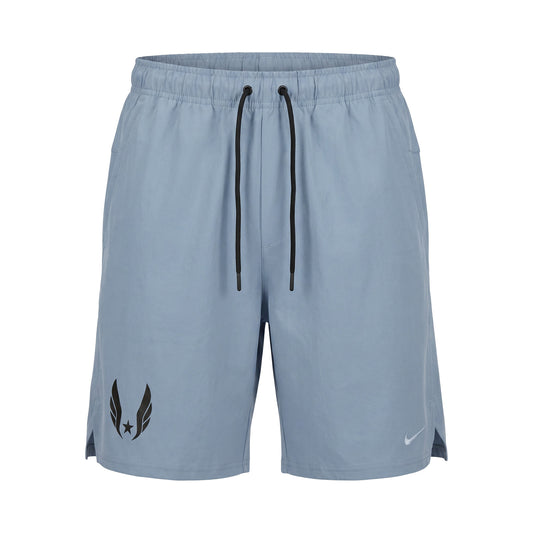 Blue athletic shorts with a logo on a white background