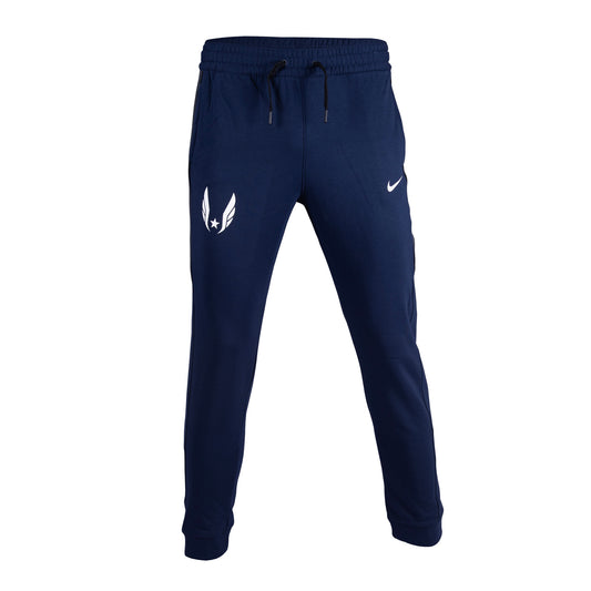 A pair of navy Nike Dri-FIT Showtime pants for youth, featuring an elastic waistband, drawstrings, and a small white Nike logo on the left thigh.