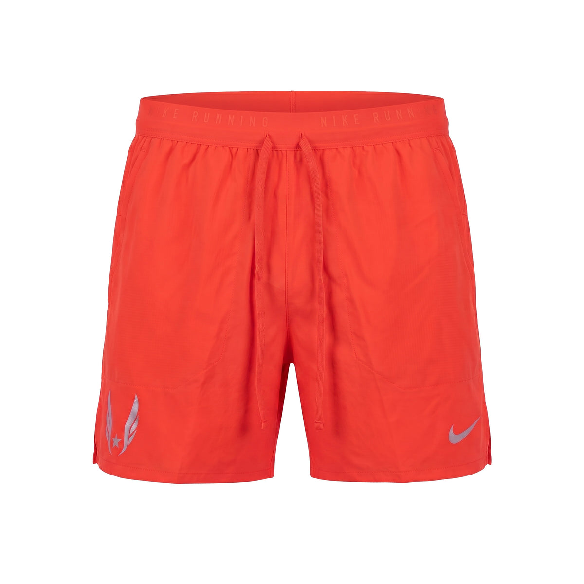 Red athletic shorts with a Nike logo on a white background