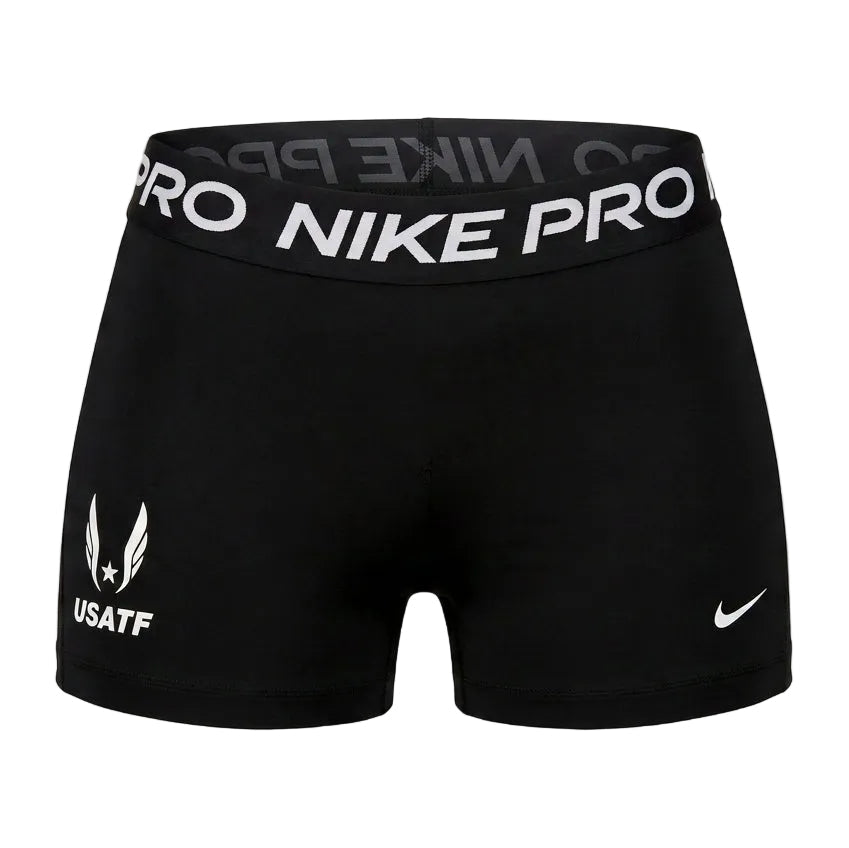 Black Nike Pro athletic shorts with a gray logo-patterned waistband, featuring a white USATF logo on the left leg and a gray Nike swoosh on the right leg.