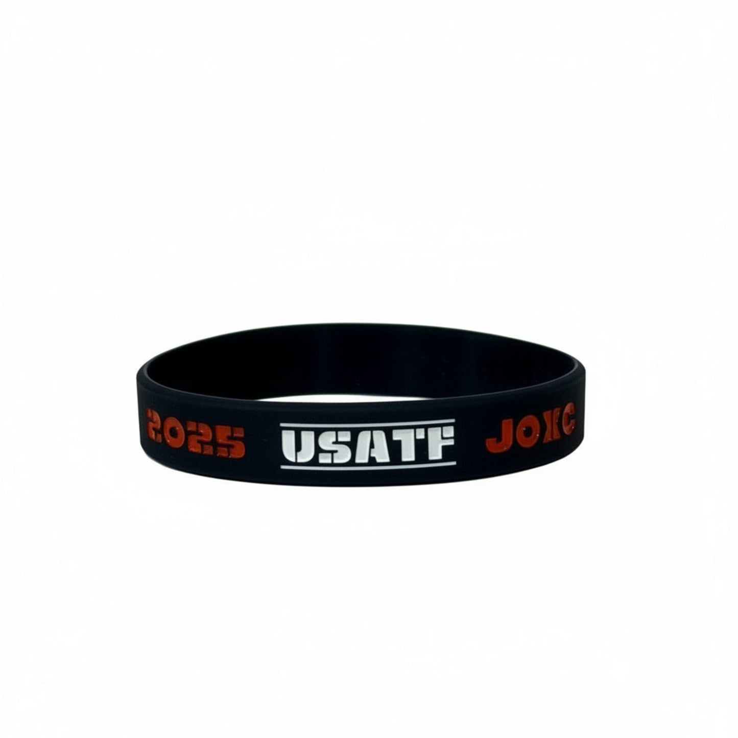 Navy wristband with red and white text on a light gray background