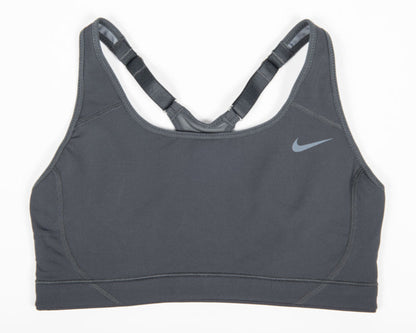 Nike USATF Women's Adjustable Sports Bra in black color with adjustable straps and Nike logo on the right chest area.