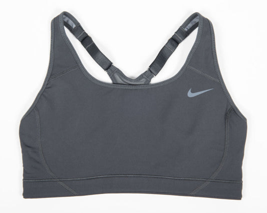Nike USATF Women's Adjustable Sports Bra in black color with adjustable straps and Nike logo on the right chest area.